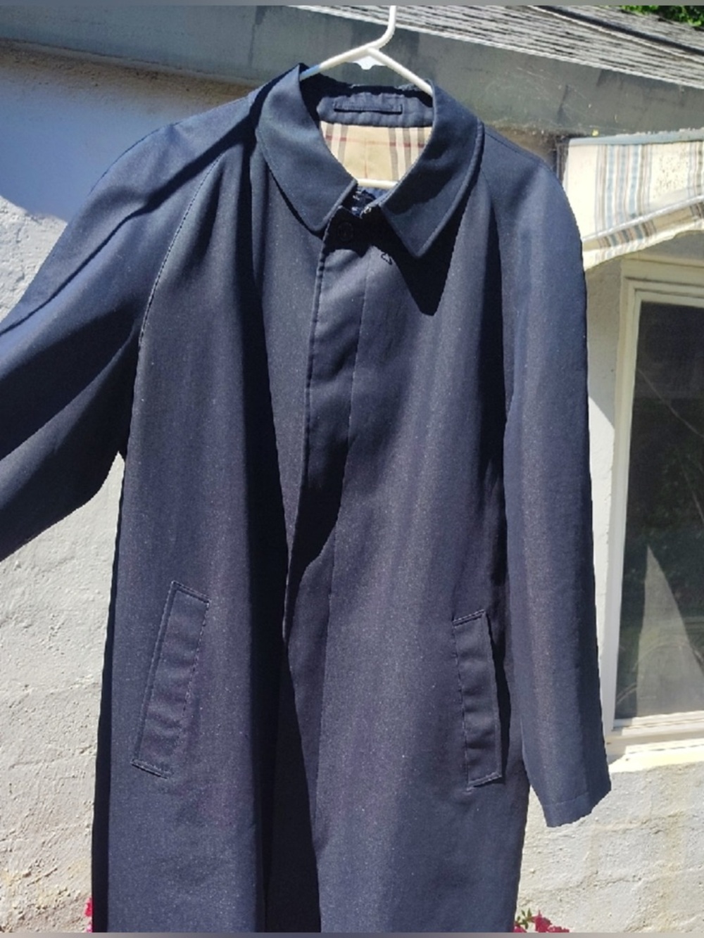 Burberry Mens Dark Navy Trench Coat. Timeless and Classic Style. 
Retail $2,250